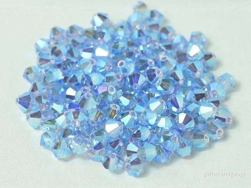 Tjeckiska Bicone - LT Sapphire 2x AB 4 mm, 30-pack - Bild 2