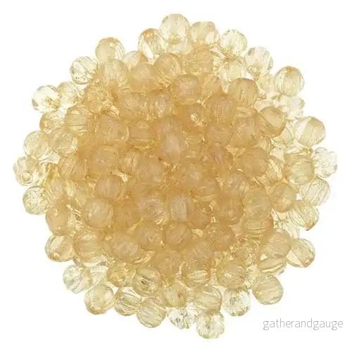 Tjeckiska Melon Round – Luster Transparent Champagne 3mm 50-pack