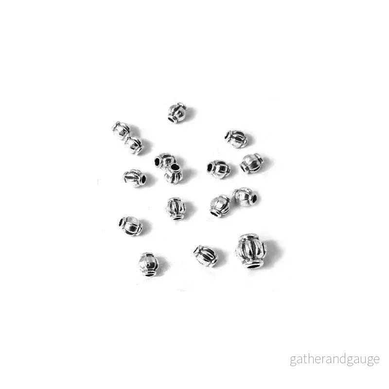 Mellandel silverfärgad – Minipumpa med ränder 3,4x4mm 20-pack Mellandel silverfärgad – Minipumpa med ränder 3,4x4mm 20-pack