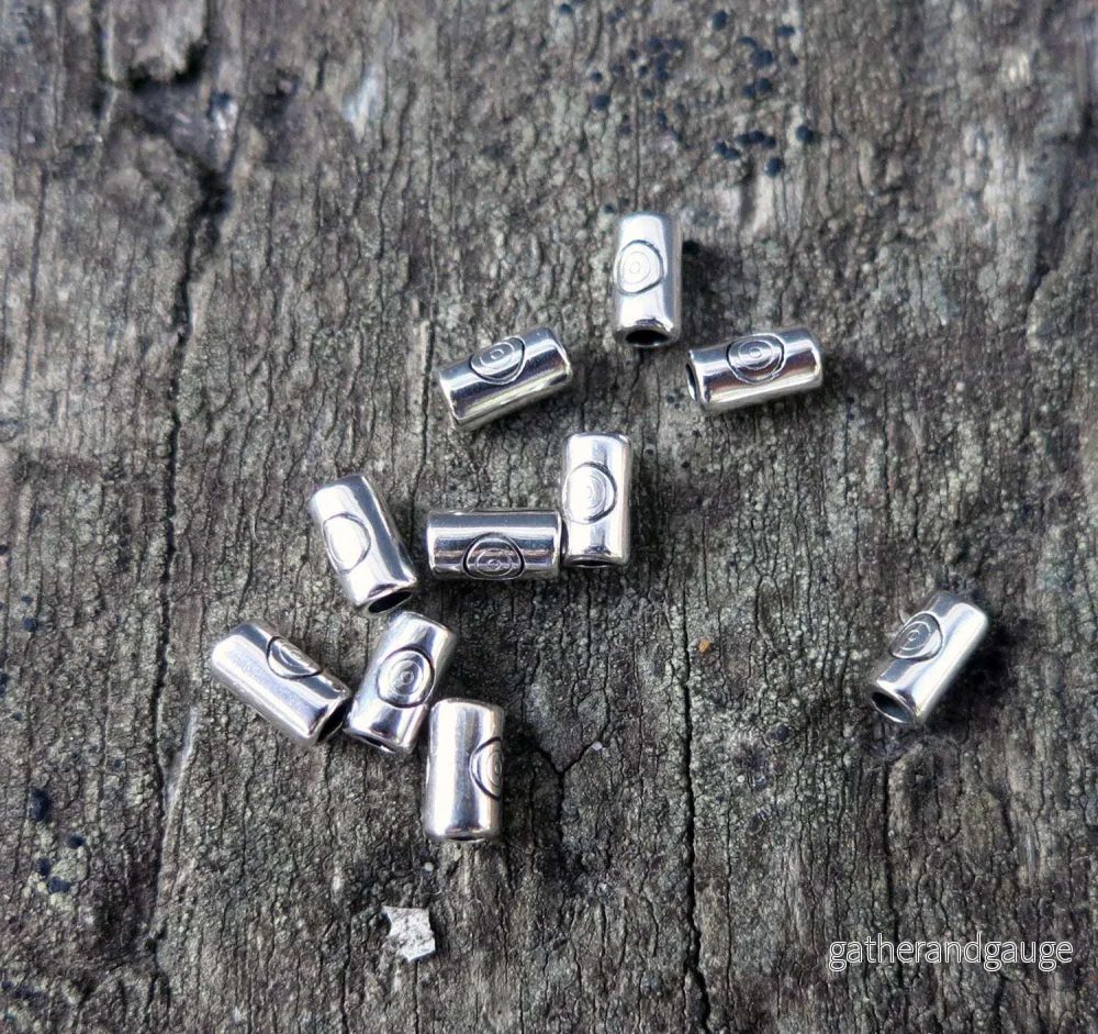 Mellandel Silverfärgad – Tub med cirkel 3,2×5,7 mm, 10-pack