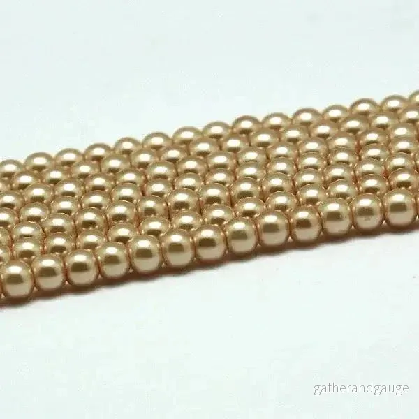 Vaxade glaspärlor - Aprikosa 10 mm, 1 sträng - Bild 2