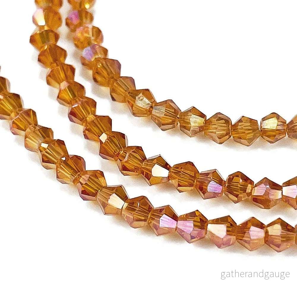 Glaspärlor Bicone – Mörk Orange, 3,7mm, 1 sträng Glaspärlor Bicone – Mörk Orange, 3,7mm, 1 sträng
