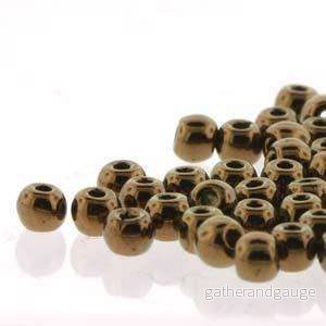 Tjeckiska Druk (Runda) - Jet Bronze True 2mm, 600 pack