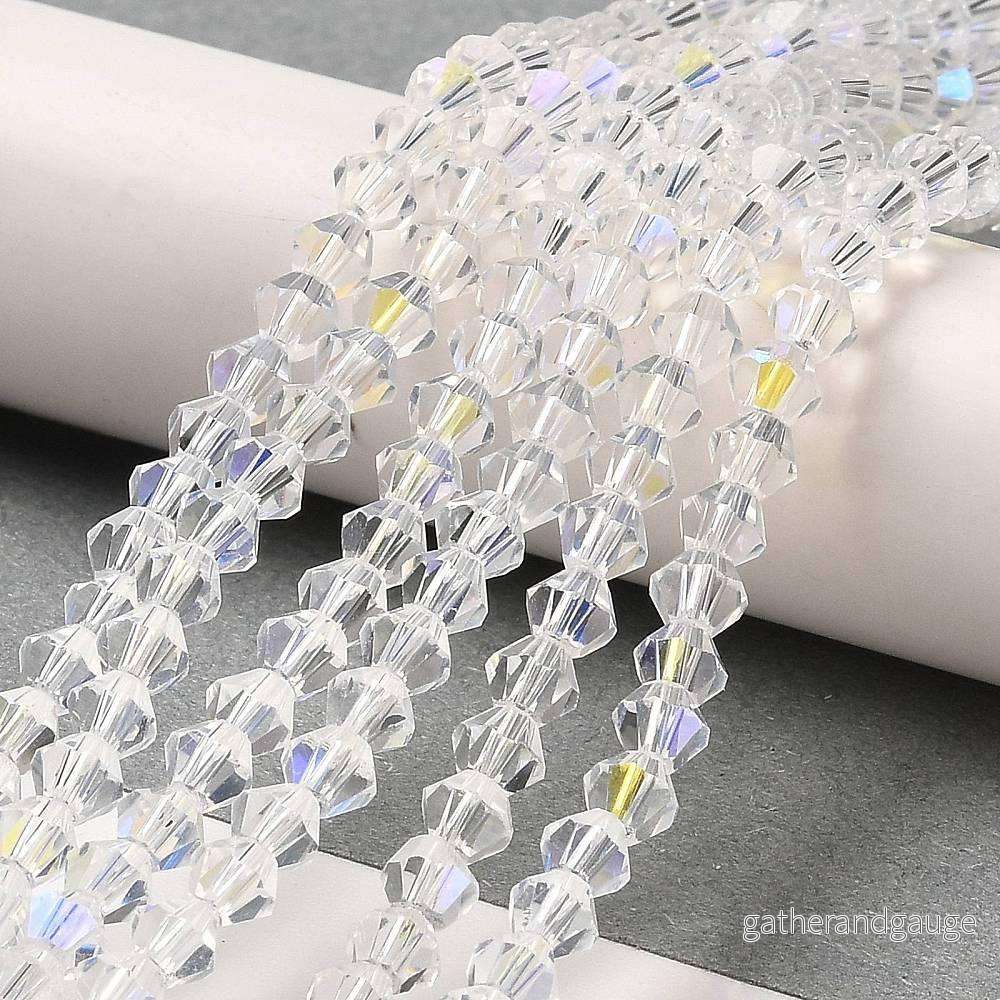 Glaspärlor Bicone - Klar AB, 3mm, 1 sträng - Bild 3
