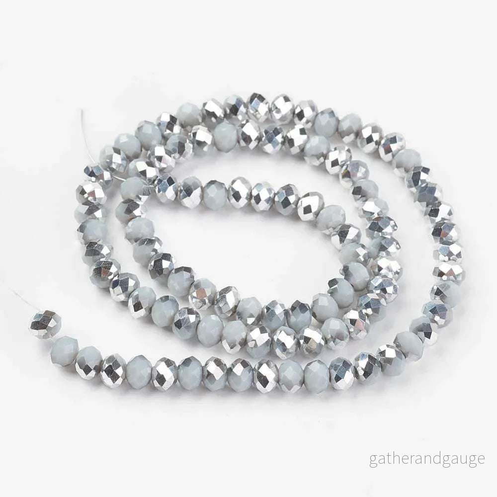 Facetterade glaspärlor - Grå/Silver, 8x6mm 1 sträng