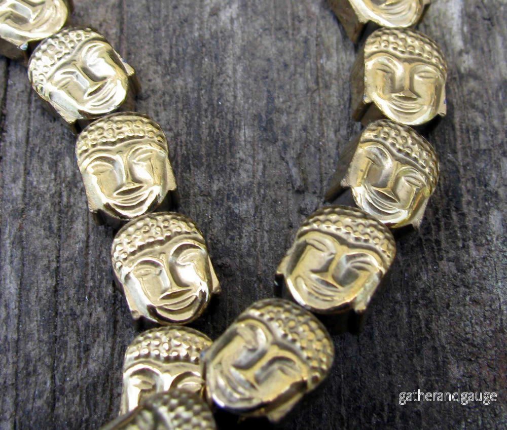 Hematit - Buddha-huvud 8x7mm i Guld 1 Sträng