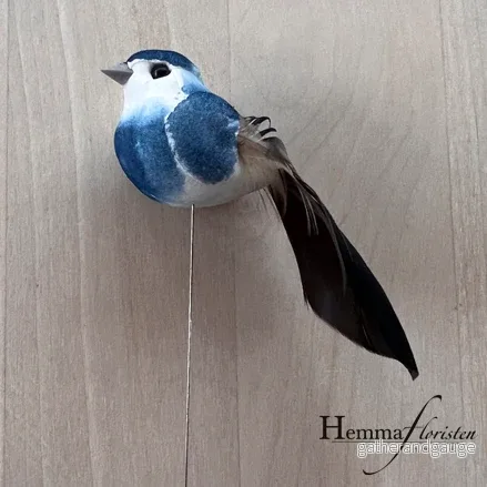 Fågel på pinne blå Fågel på pinne blå