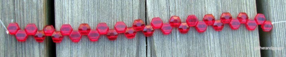 Honeycomb Jewel - Ruby 6mm, 1 sträng