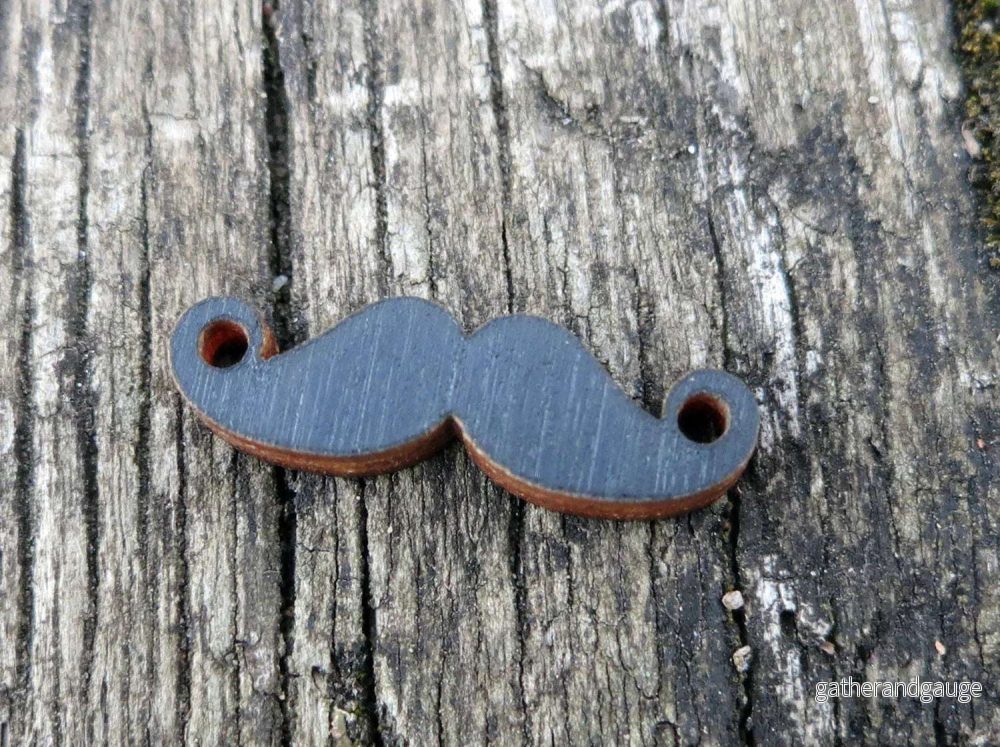 Connector Trä – Mustasch Svart 25x7mm 1 styck