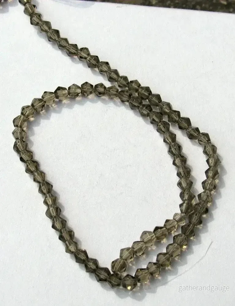 Glaspärlor Bicone - Grå, 4 mm, 1 sträng - Bild 2