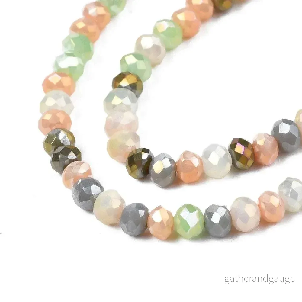 Facetterade glaspärlor – Grå grön Mix, 3x2mm, 1 sträng