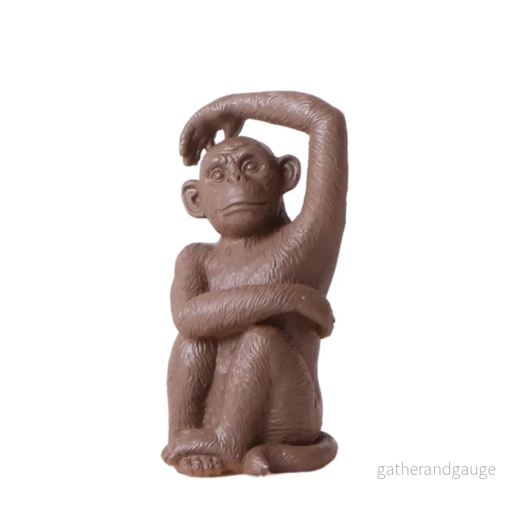 Ornament – Sittande apafigur – Brun
