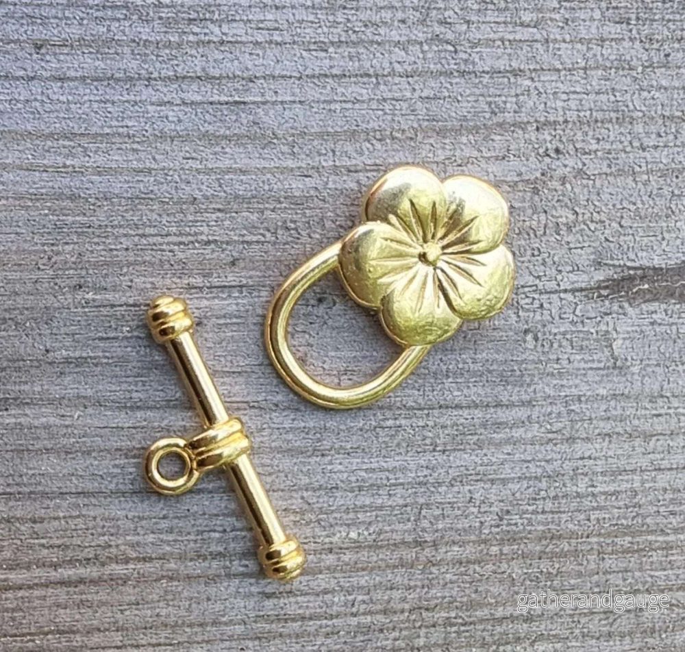 Stavlås 24K Guldpläterad – 5 Bladig Blomma 1 set