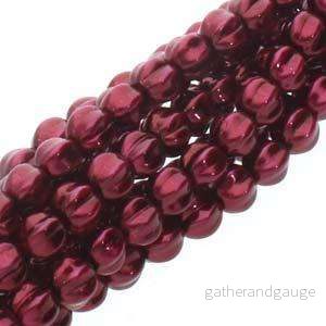Tjeckiska vaxade glaspärlor - Melon Burgendy 6mm, 1 sträng