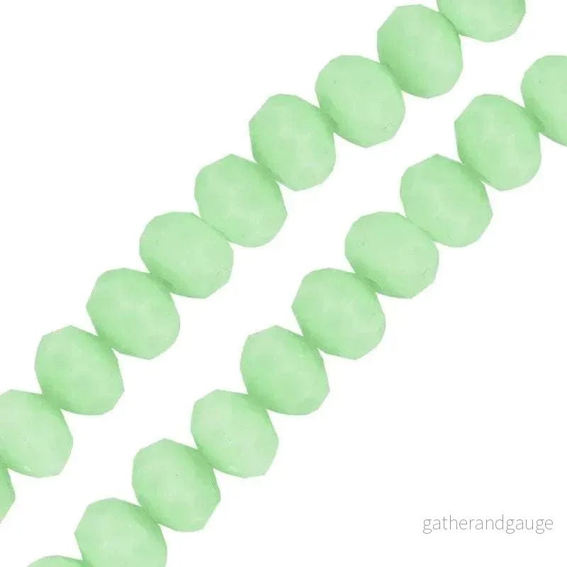 Facetterade glaspärlor – Matte ljusgrön, 3×2.5mm, 1 sträng Facetterade glaspärlor – Matte ljusgrön, 3×2.5mm, 1 sträng