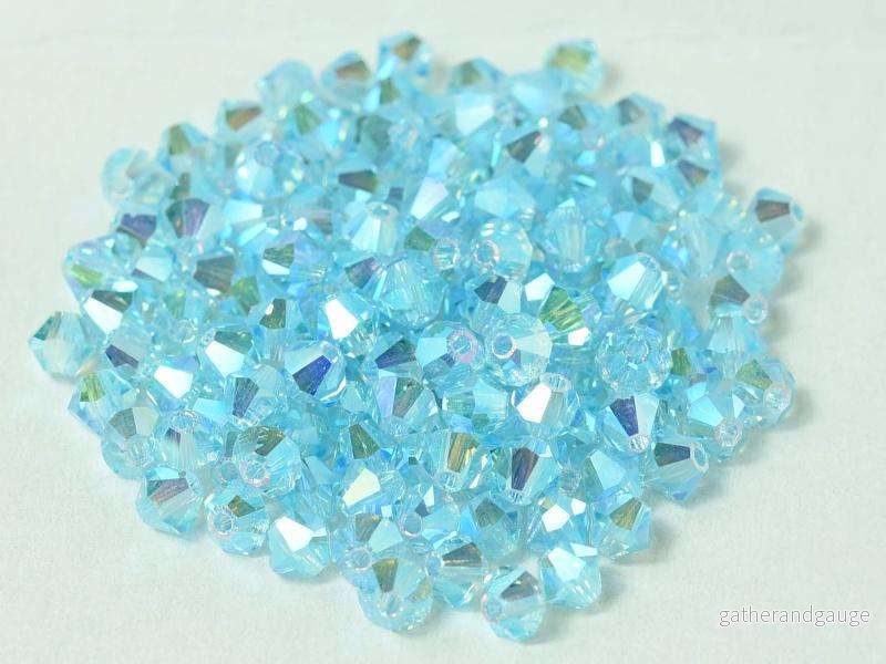 Tjeckiska Bicone - Aqua Bohemica 2x AB, 4 mm, 30-pack - Bild 2