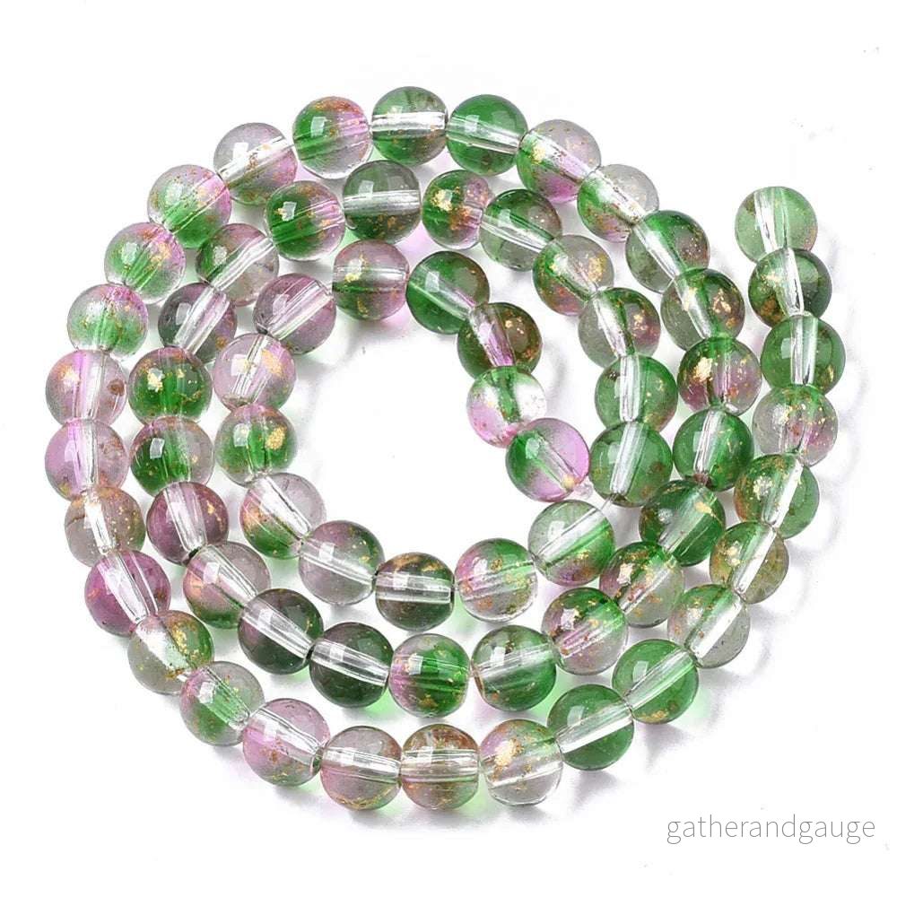 Glaspärlor Rund - Rosa/Grön Guldshimmer 6mm 1 sträng