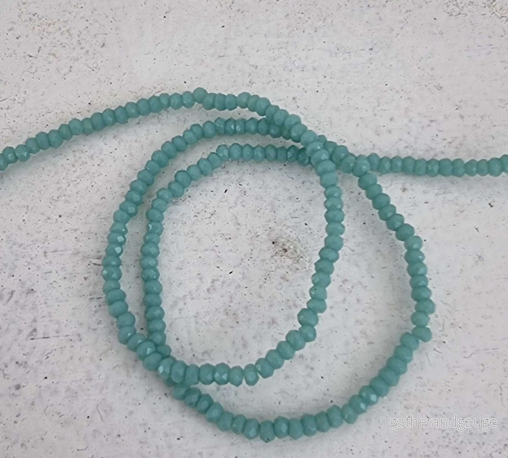 Facetterade glaspärlor - Turkos 2,6x1,7mm 1 sträng