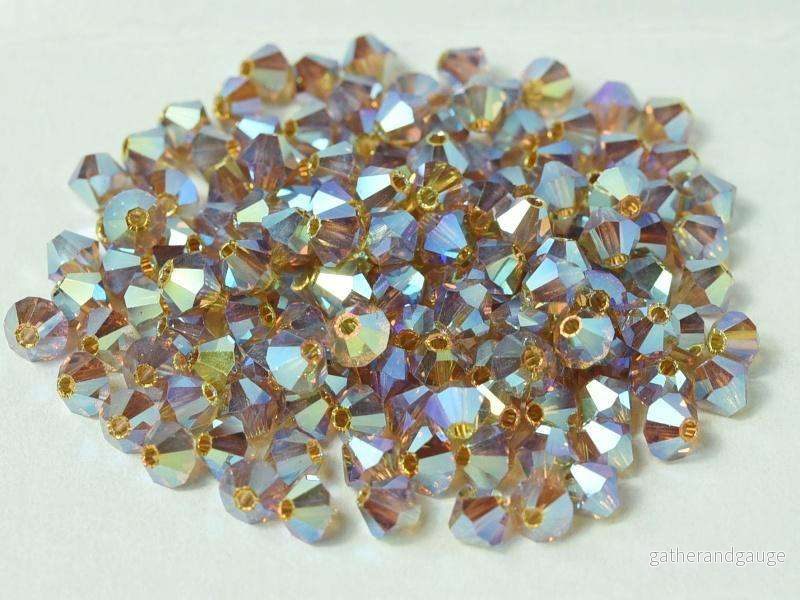 Tjeckiska Bicone - LT Colorado Topaz 2x AB, 4 mm, 30-pack - Bild 2