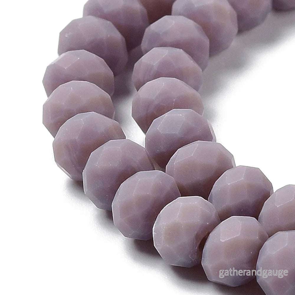Facetterade glaspärlor - Matt Tistel, 6x5mm 1 sträng