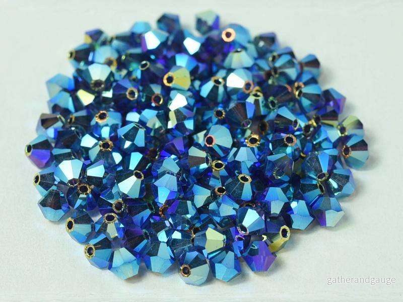 Tjeckiska Bicone - Deep Tanzanite 2x AB, 4 mm, 30-pack - Bild 2